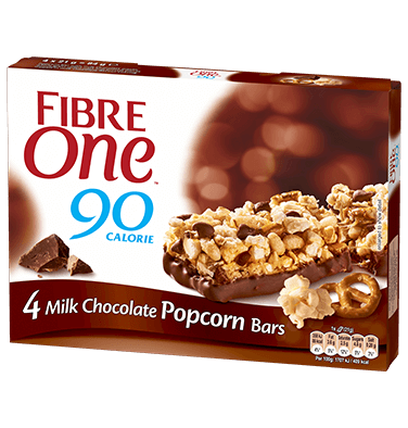 A box of 4 Fibre One 90 Calorie milk chocolate popcorn bars.